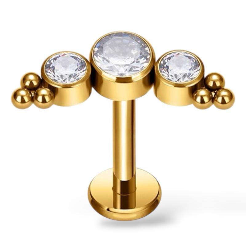 Ohrring aus Titan und Gold mit Zirkonia und Kugeln