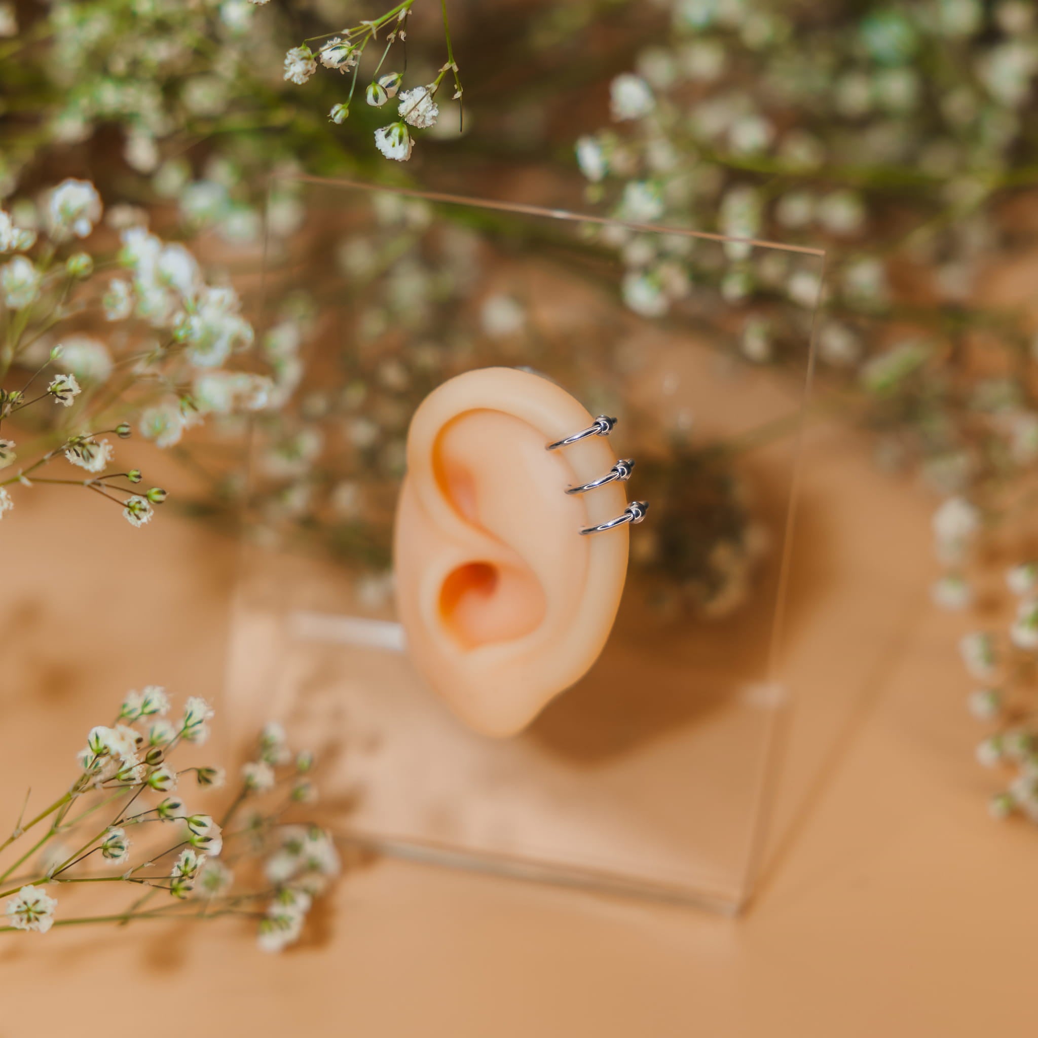 Ohrklemme mit Kugeln