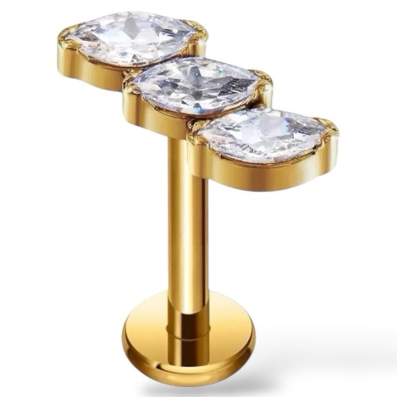 Labret-Ohrring aus Titan und Gold mit drei tropfenförmigen Zirkonen