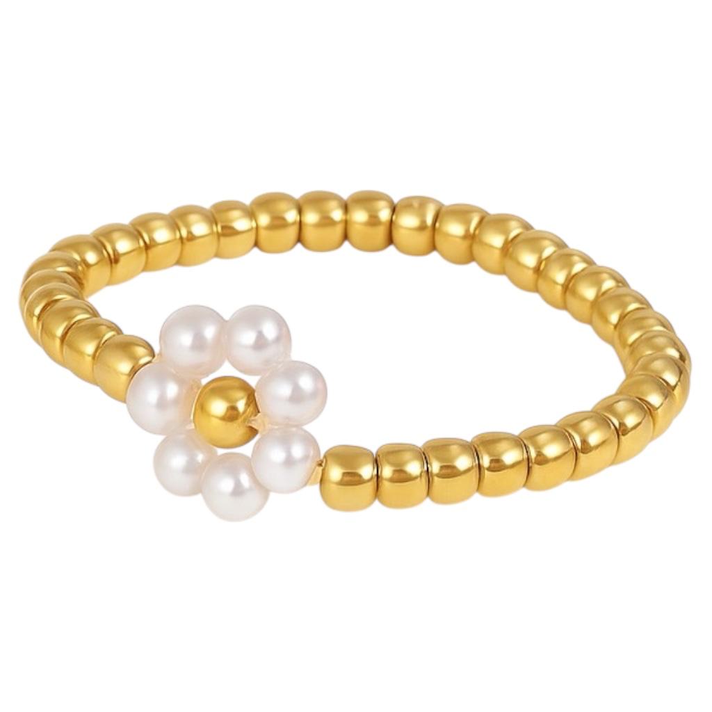 Pierścionek subtelny urok złotych perełek