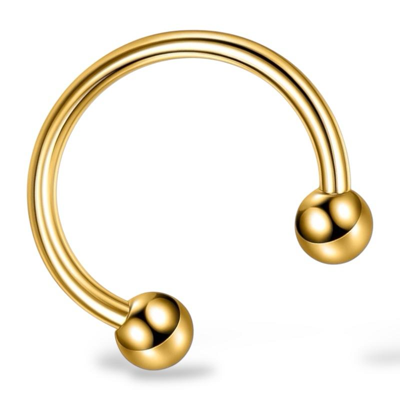 Goldfarbenes Hufeisen aus Stahl mit zwei Kugeln