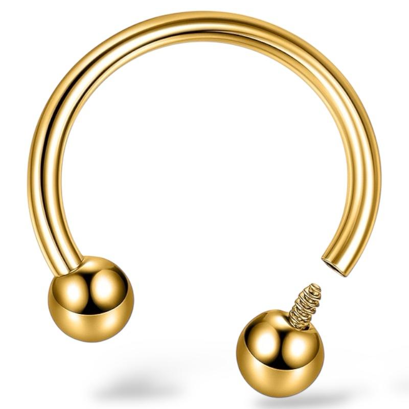 Goldfarbenes Stahlhufeisen mit zwei innenliegenden Gewindekugeln