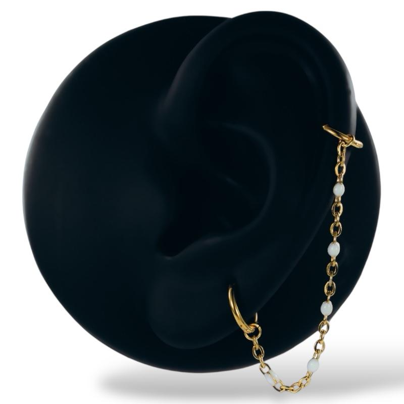 Goldkette und schillernde Details