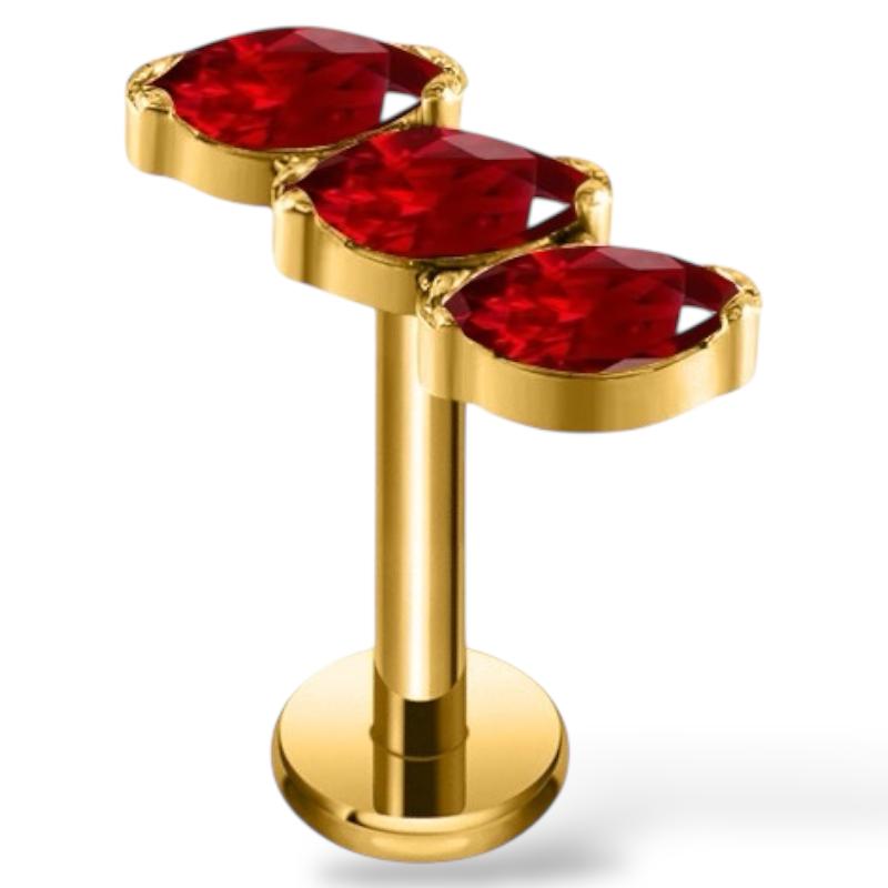 Labret-Ohrring aus Titan und Gold mit drei tropfenförmigen Zirkonen