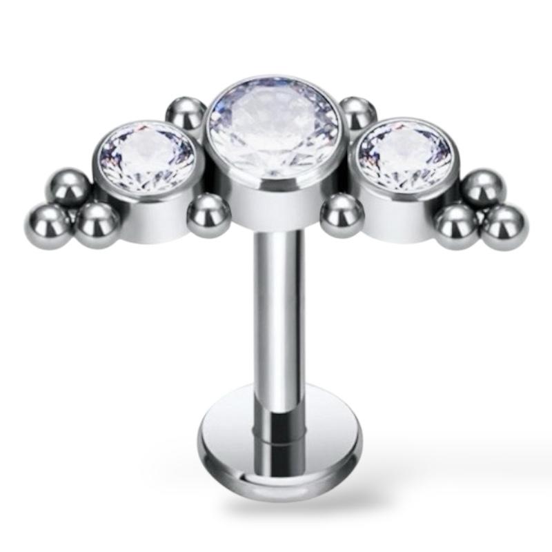Labret-Ohrring aus Titan und Gold mit drei Zirkonia und Kugeln