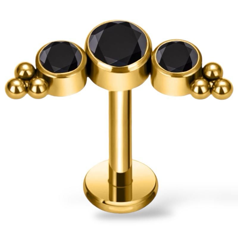 Ohrring aus Titan und Gold mit Zirkonia und Kugeln