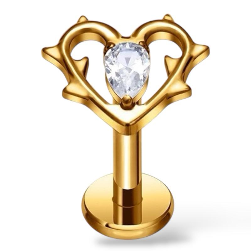 Ein Labret aus Titan in Herzform mit einem Zirkonia in der Mitte