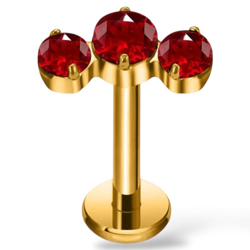 Labret aus Titan und Gold mit drei Zirkonen