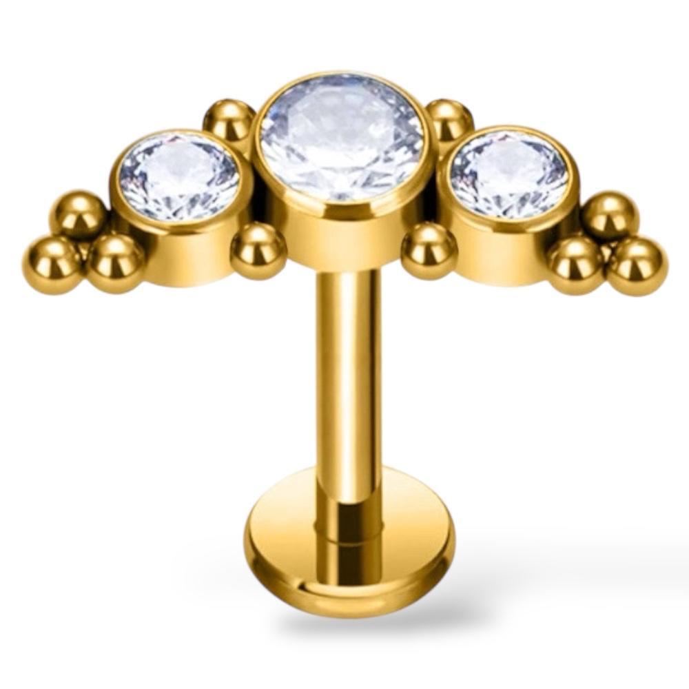 Labret-Ohrring aus Titan und Gold mit drei Zirkonia und Kugeln