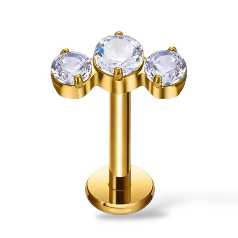 Labret aus Titan und Gold mit drei Zirkonen